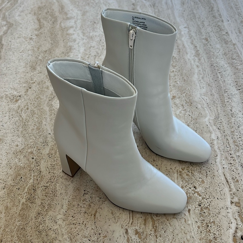 Designer Steve Madden bone colored eight boot worn twice.